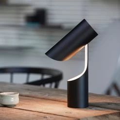 Mutatio Table Lamp By Le Klint 9 Mutatio Table Lamp By Le Klint -Lighting Store Mutatio on wood 11 FB